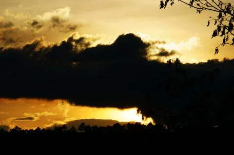 Dramatic clouds on evening sky Stock Photos