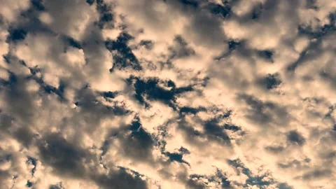 Dramatic clouds filling the sky with textured layers in beige  Stock Footage 339366591