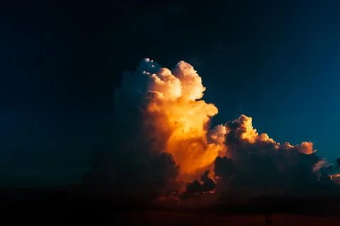 Dramatic clouds formation at sunset. Stock Photos