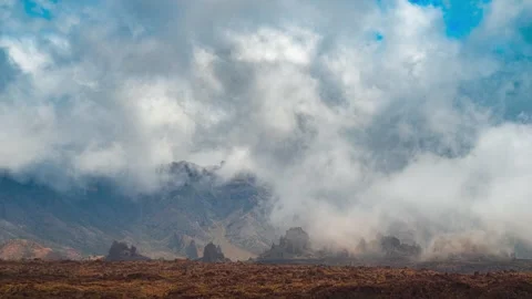 Dramatic Clouds Forming Over Volcanic Rock Formations Tenerife 4K Timelapse 動画素材 334398235