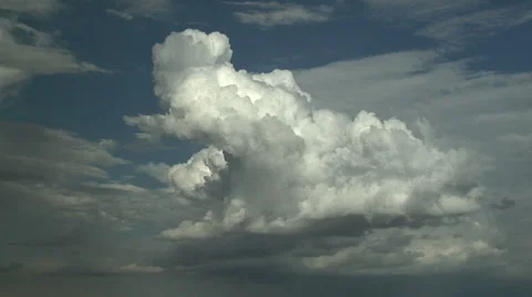 Dramatic clouds forming into Rainbow 動画素材 54746661