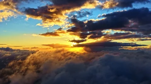 Dramatic Clouds Illuminated By Sunset Lights. Aerial Slow Motion Shot Stock Footage 318198623
