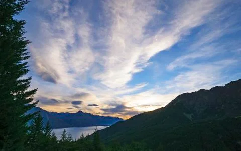 Dramatic clouds in a mountain sunset 스톡 사진