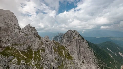 Dramatic Clouds Moving Over Mountains Peak near Mangart in Slovenia Stock Footage 130277304