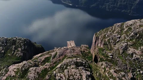 Dramatic clouds moving over preikestolen pulpit rock in norway Stock Footage 318483126