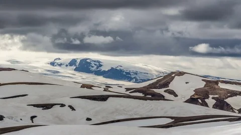 Dramatic clouds moving over winter volcanic mountains of katla in Iceland Stock Footage 84727343