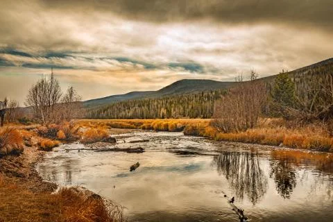 Dramatic clouds in October over the Colorado river in the Rocky Mountain Nati Stock Photos