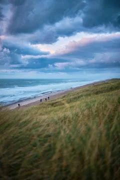 Dramatic clouds over the beach of Vejlby Klit in Denmark Stock Photos