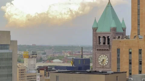 Dramatic Clouds over Downtown Clocktower Stock Footage 65320744