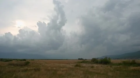 Dramatic clouds over the fields. A storm is coming. Stock Footage 321685431