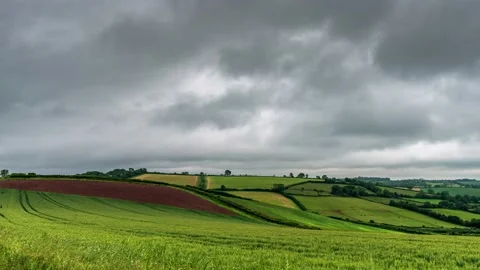 Dramatic clouds over the fields in Time Lapse, Devon, England Stock Footage 155974763