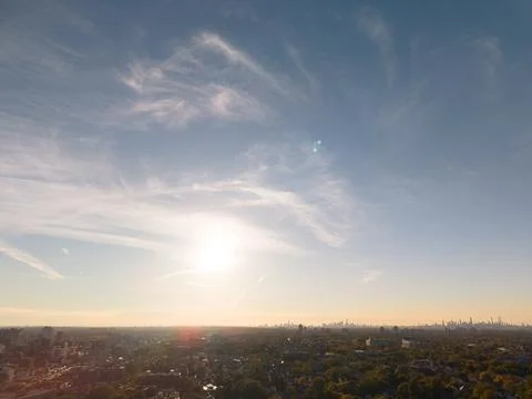 Dramatic clouds over the Manhattan skyline seen from Queens New York City Фото