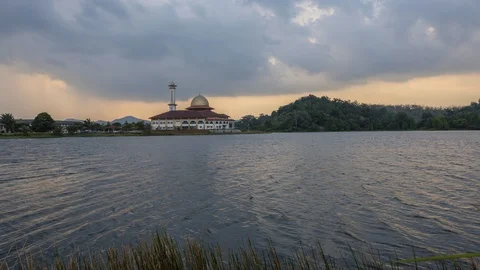 Dramatic clouds over mosque near the lake Stock Footage 101408341
