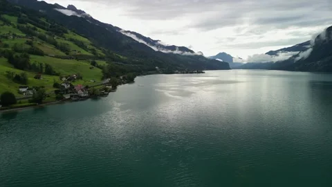Dramatic clouds over mountain lake Stock Footage 249616102
