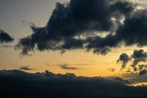 Dramatic Clouds over Mountain at Sunset Fotos de archivo