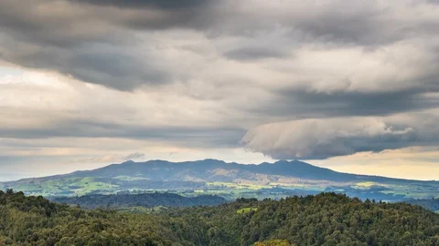 Dramatic clouds over Pirongia mountains forest in New Zealand nature Time lapse Stock-Footage 105804487
