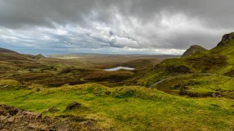 Dramatic Clouds Over The Quiraing Landscape Scotland Stock Photos