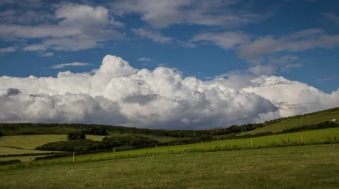 Dramatic Clouds over Rolling Hills Video stock 40013475