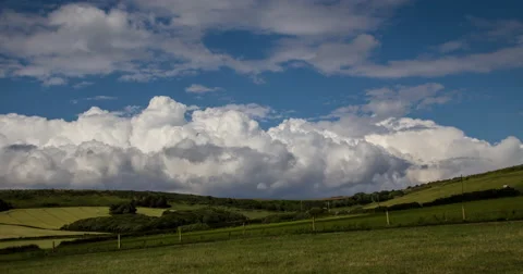 Dramatic Clouds over Rolling Hills in 4K Stock Footage 40014588