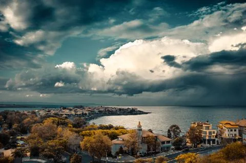 Dramatic clouds over the sea Stock Photos