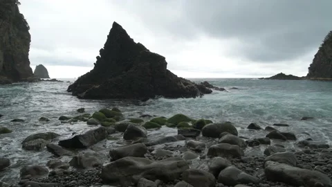 Dramatic clouds over sea stacks in the sea in Izu Peninsula, Shizuoka Stock Footage 194407711