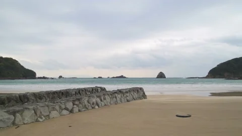 Dramatic clouds over sea stacks in the sea in Izu Peninsula, Shizuoka Stock Footage 194407827