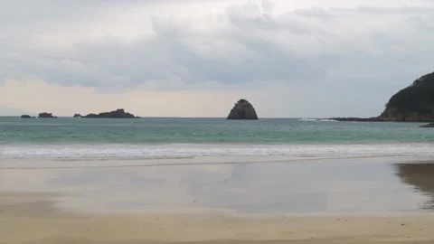 Dramatic clouds over sea stacks in the sea in Izu Peninsula, Shizuoka Stock Footage 194407849