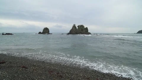 Dramatic clouds over sea stacks in the sea in Izu Peninsula, Shizuoka Stock Footage 194407948