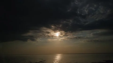 Dramatic clouds over the sea at sunset. Stock Footage 245139080