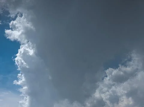 Dramatic clouds over serene outdoor landscape during daytime Photos