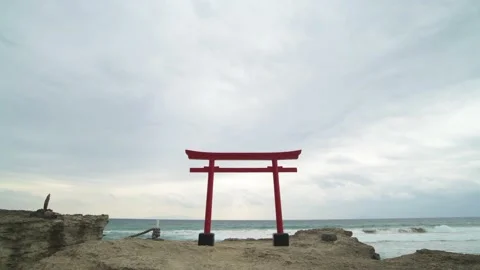 Dramatic clouds over shrine torii gate in the sea in Izu Peninsula, Shizuoka Stock Footage 194407812