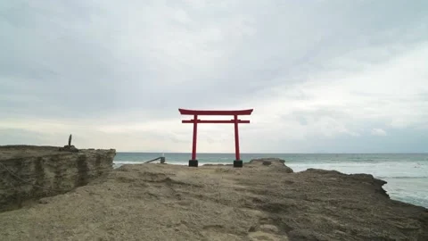 Dramatic clouds over shrine torii gate in the sea in Izu Peninsula, Shizuoka Stock Footage 194407822