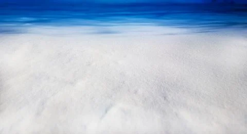 Dramatic clouds over smooth snow landscape background Stock Photos