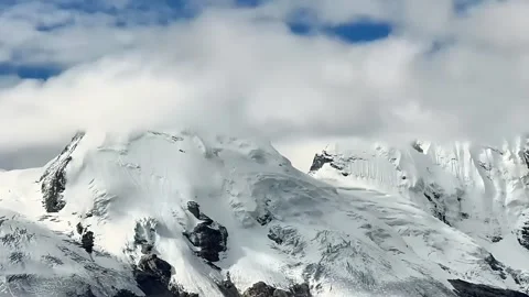 Dramatic Clouds Over Snow Capped Mountains Qinghai-Tibet Plateau China Stock Footage 339305616
