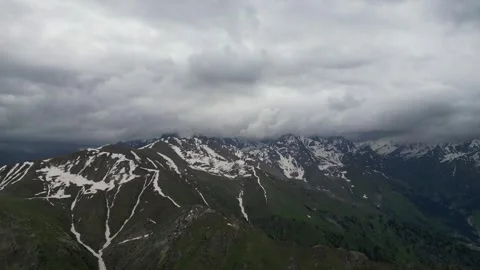 Dramatic Clouds Over Snowy Trans-Ili Alatau Stock Footage 345386168