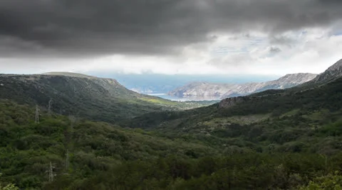 Dramatic clouds over valley Stock Footage 24703053