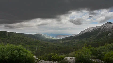 Dramatic clouds over valley Stock Footage 24710492