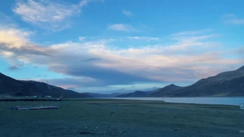 Dramatic clouds over Yamdrok Lake Tibet China 動画素材 333806188
