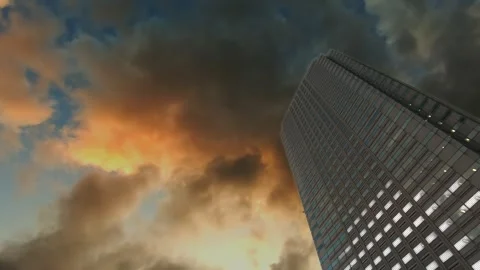 Dramatic Clouds reflecting in Building Video stock 248734169
