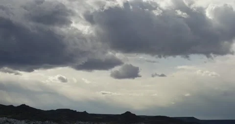 Dramatic clouds rolling across a dark and moody sky Stock Footage 172531258