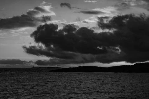 Dramatic clouds with sea and light Stock Photos