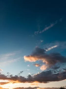 Dramatic Clouds at Sunset in Blue Sky 스톡 사진