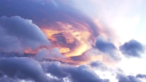 Dramatic clouds at sunset. Bright glow of yellow rays in a dense cloud. The Stock Footage 237454393