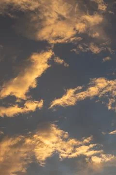 Dramatic Clouds at Sunset with Golden Light Fotos de archivo