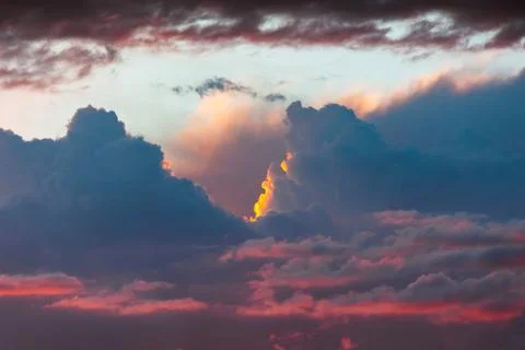 Dramatic clouds at sunset or sunrise. Cloudscape background Stock Photos