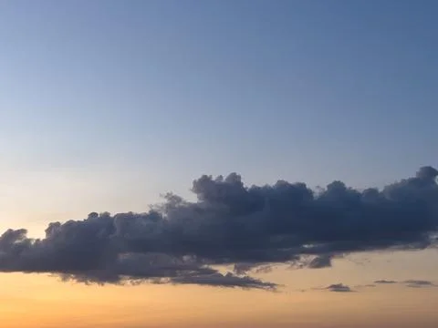 Dramatic Clouds at Sunset Sky Stock Photos