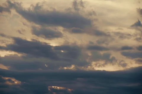 Dramatic Clouds at Sunset Timelapse – Golden horizon sky transforms with shiftin Stock Footage 319928843