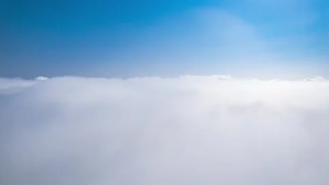 Dramatic clouds surging and rolling across the sea of clouds Stock Footage 336841605