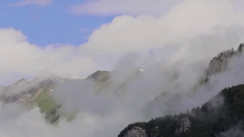 Dramatic Clouds in the Swiss Alps 01 Stock Footage 78599480