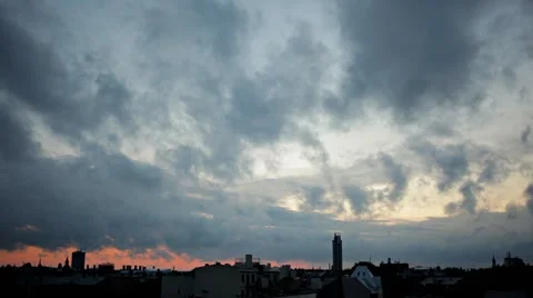Dramatic Clouds Timelapse At Sunset Over A City Skyline Silhouette Stock-Footage 52205001